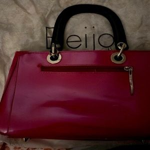 Gently used Beijo handbag.